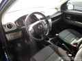 Mazda Demio 2da gen interior LHD.jpeg